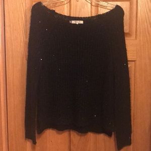 Jennifer Lopez  Black with sequin sweater